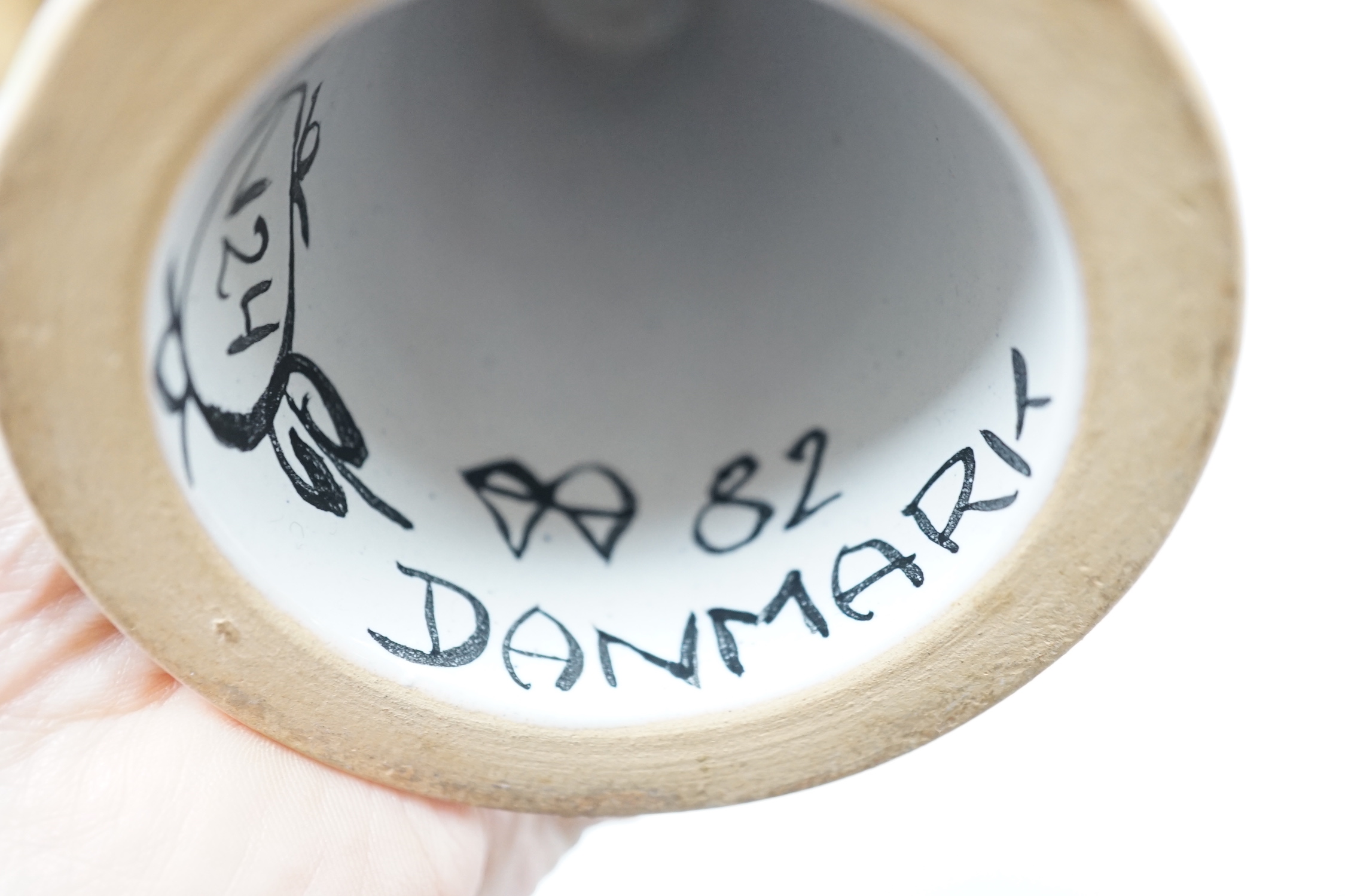 A Bjørn Wiinblad, Denmark vase in the form of a female head with large hat, 20.5cm